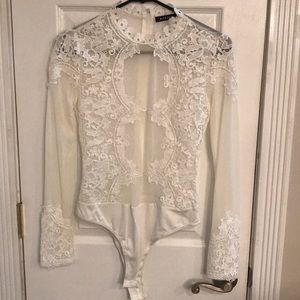 Long sleeve lace bodysuit.